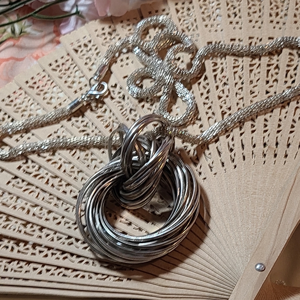 Rare unique necklace for sale.silver the chain is super nice s well